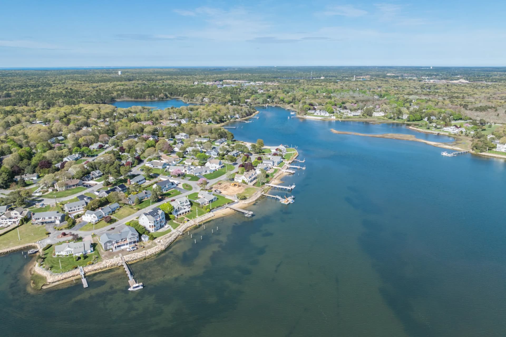 Aerial view of Yarmouth waterfront village with homes along the harbor